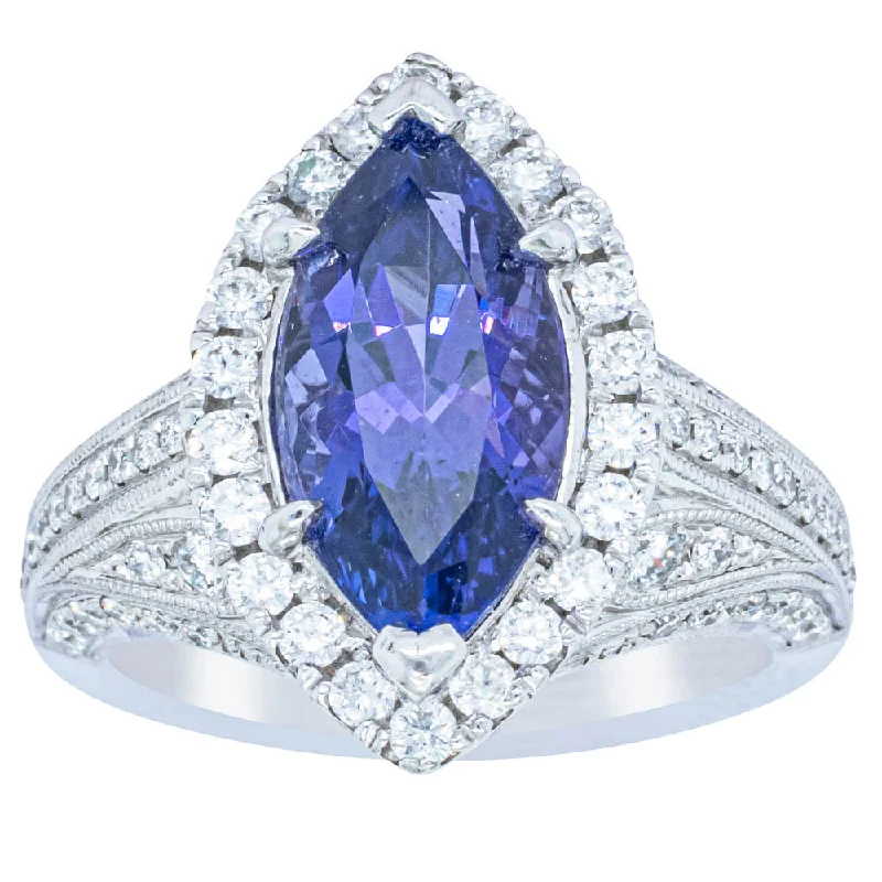 18ct White Gold 3.84ct Tanzanite & Diamond Halo Ring