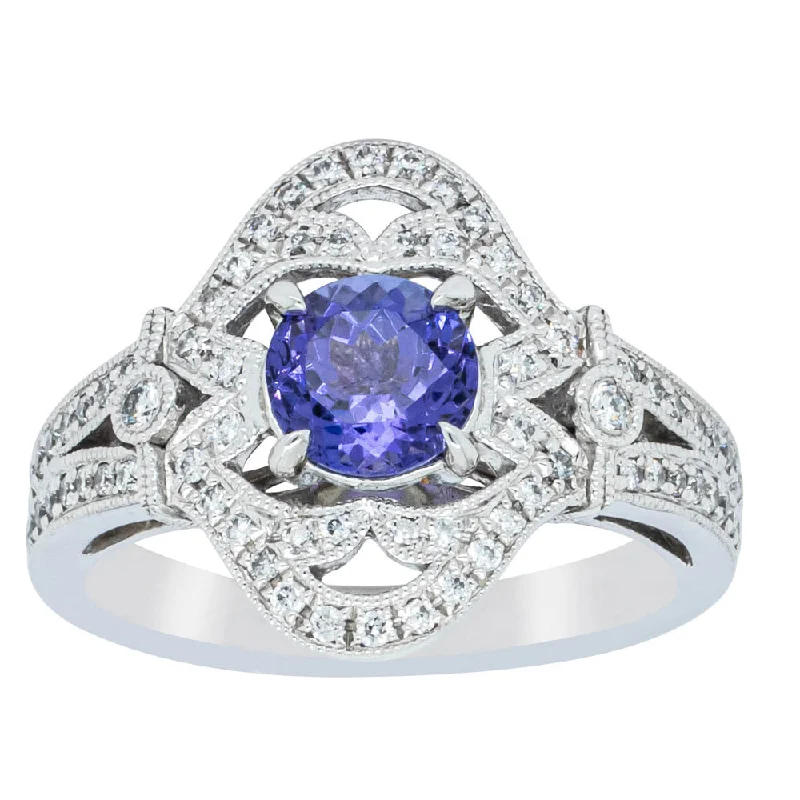 18ct White Gold .97ct Tanzanite & Diamond Halo Ring